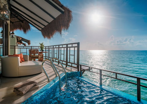 The Palafitos at El Dorado Maroma are over-the-water bungalows that come with a verandah, a private infinity pool and lounges.
