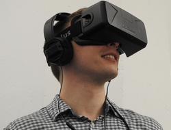 Man with plastic black device over eyes