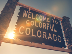 Colorado welcome sign (Credit: Getty/welcomia) Colorado welcome sign