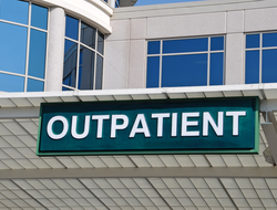 Hospital Building Outpatient Care Sign primary care CREDIT: Getty/Mark Winfrey hospital building with a sign that says outpatient