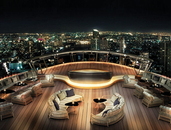 Alfresco 64 Editorial Outdoor deck of Alfresco 64 looking out over Bangkok, Thailand at night