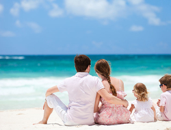 Mexico Family Getty Family vacationing on a beach