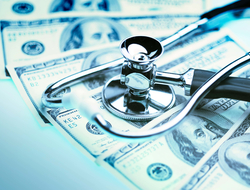 Healthcare costs stethoscope on money