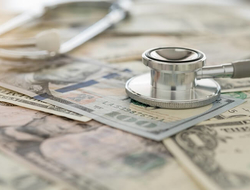 Healthcare Costs Finance Money Cash Collections stethoscope (Getty/utah778) A stethoscope and paper money.