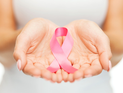 Breast Cancer Ribbon Photo via Shutterstock by Syda Productions
