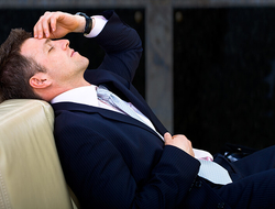 Tired/Sleeping Businessman - nyul/iStock/Getty Images Plus/Getty Images Tired/Sleeping Businessman - nyul/iStock/Getty Images Plus/Getty Images