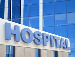 Healthcare hospital sign general abstract (Getty/Manuel-F-O) A blue hospital sign on the side of a building