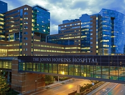Johns Hopkins Hospital exterior building (Getty/DelmasLehman) for editorial use only The Johns Hopkins Hospital at night from Orleans Street.