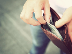 Finance money cash patient consumer payment deductible copay collections (Getty/lzf) A man taking cash out of his wallet