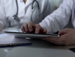 Doctors with tablet Doctors with a tablet