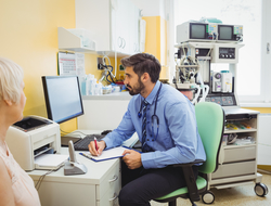 doctor writing prescription printer