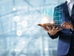 chief data officer executive using tablet with images of data and analytics