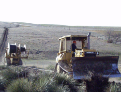Plowing fiber optic cable in Northwest Kansas (Image: Rural Telephone via USDA Flickr stream) Plowing fiber optic cable in Northwest Kansas (Image: Rural Telephone via USDA Flickr stream)