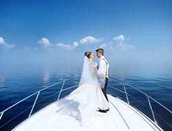 Cruise Ship Wedding Getty Happy bride and groom on a yacht