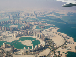 Doha Qatar Getty Airplane flying over Doha Qatar