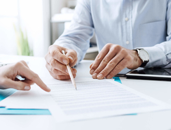 Negotiating a lease Business people negotiating a contract