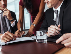 Businesspeople having a meeting in office Businesspeople having a meeting in office