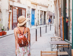 Woman Traveler // Photo by anyaberkut/iStock/Getty Images Plus/Getty Images Woman traveling alone in Europe