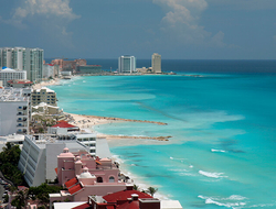 Cancun - rebelml/iStock/Getty Images Plus/Getty Images A view of the beach and hotels in Cancun